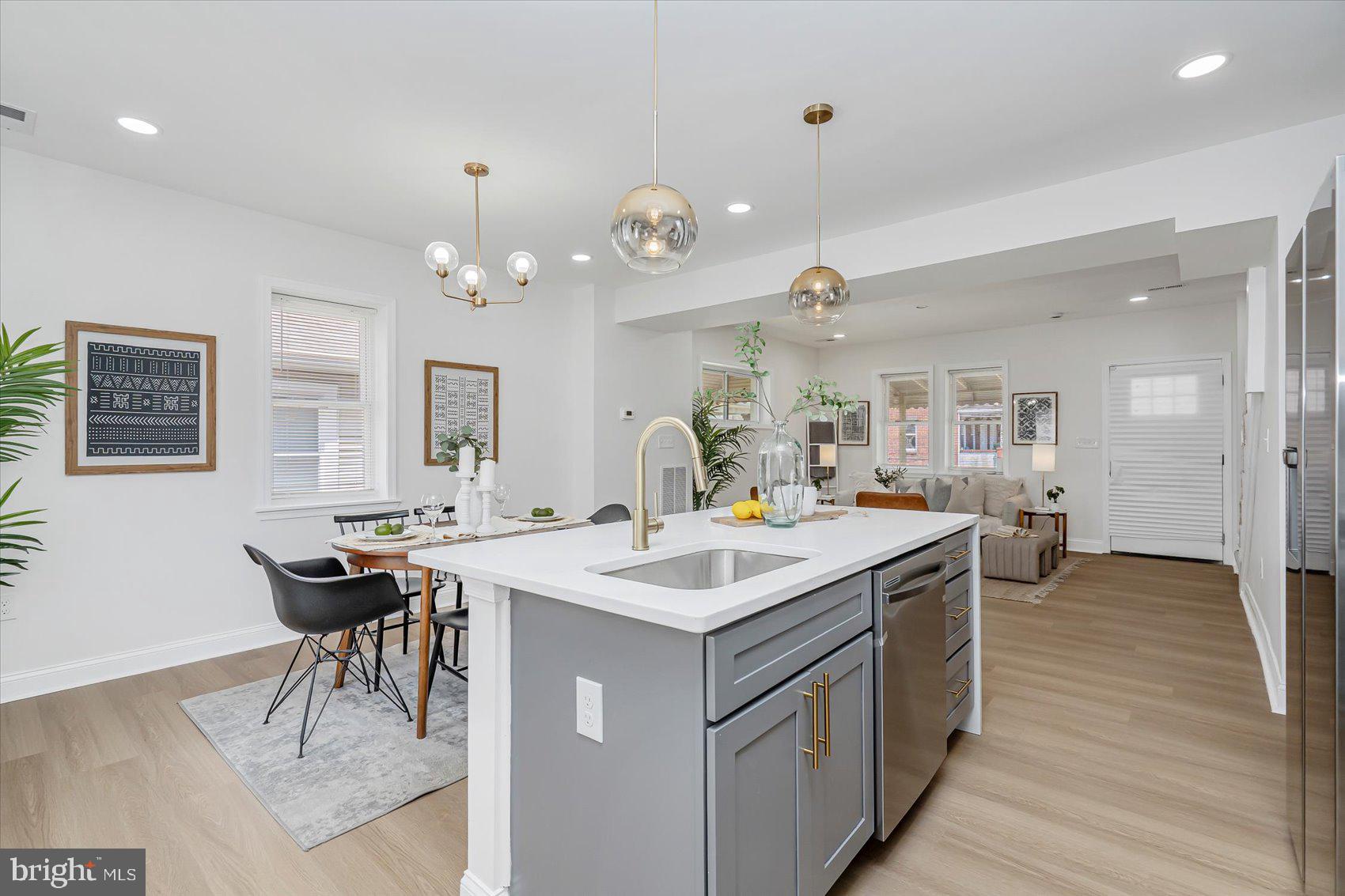 5412 Clover Road Baltimore, MD 21215 - Photo 13 of 42 a view of a kitchen counter space and breakfast area