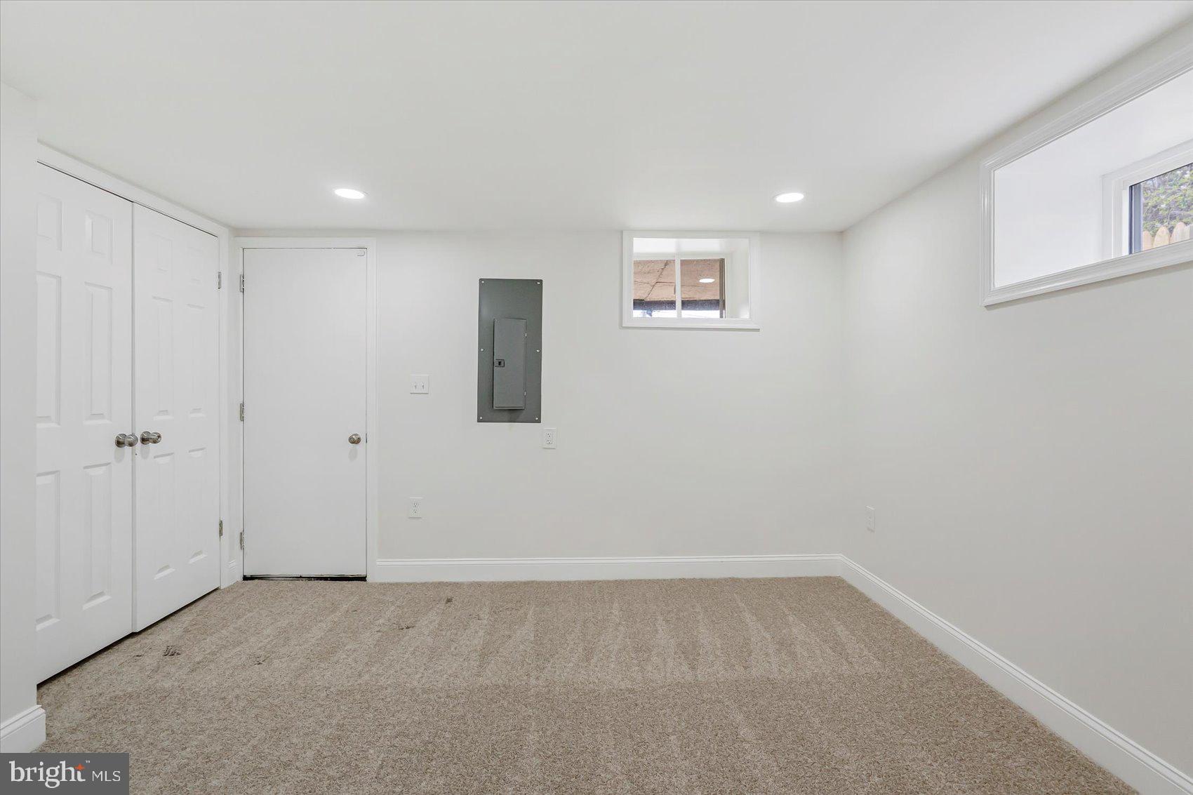 5412 Clover Road Baltimore, MD 21215 - Photo 19 of 42 a view of a livingroom with an empty space