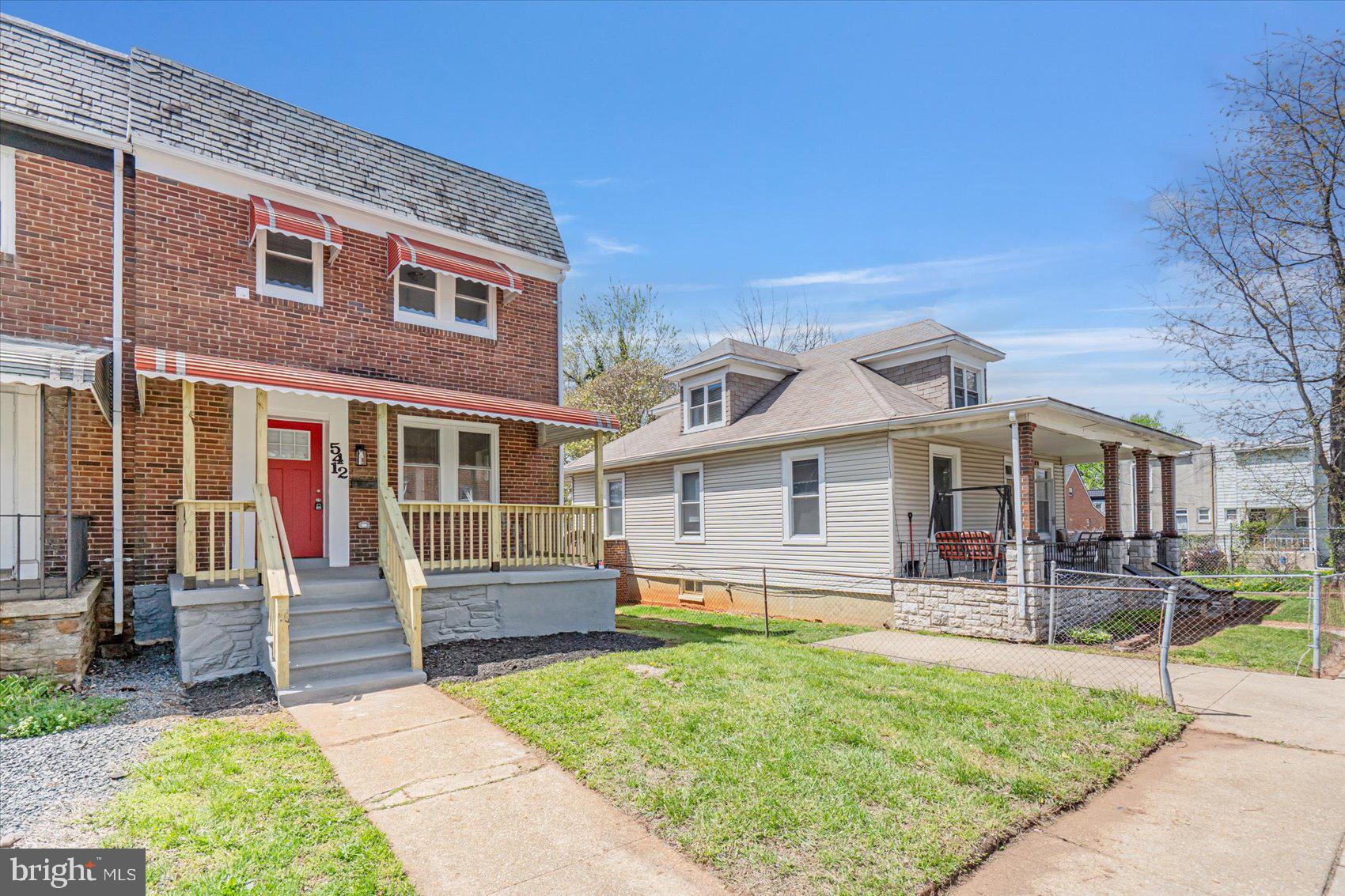 5412 Clover Road Baltimore, MD 21215 - Photo 41 of 42 front view of a house with a yard