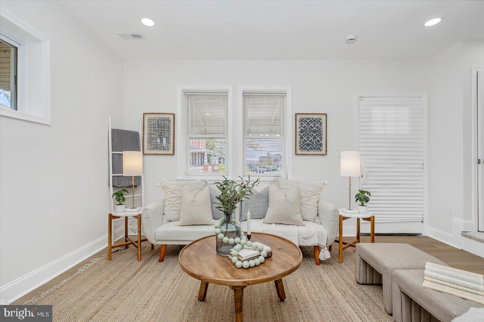 5412 Clover Road Baltimore, MD 21215 - Photo 5 of 42 a living room with furniture and wooden floor