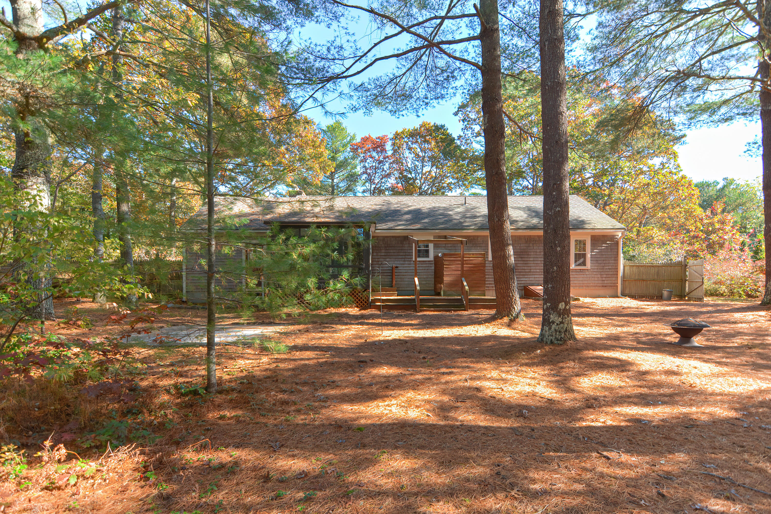 235 Simon Narrows Road Mashpee, MA 02649 - Photo 28 of 30 a front view of a house with a yard
