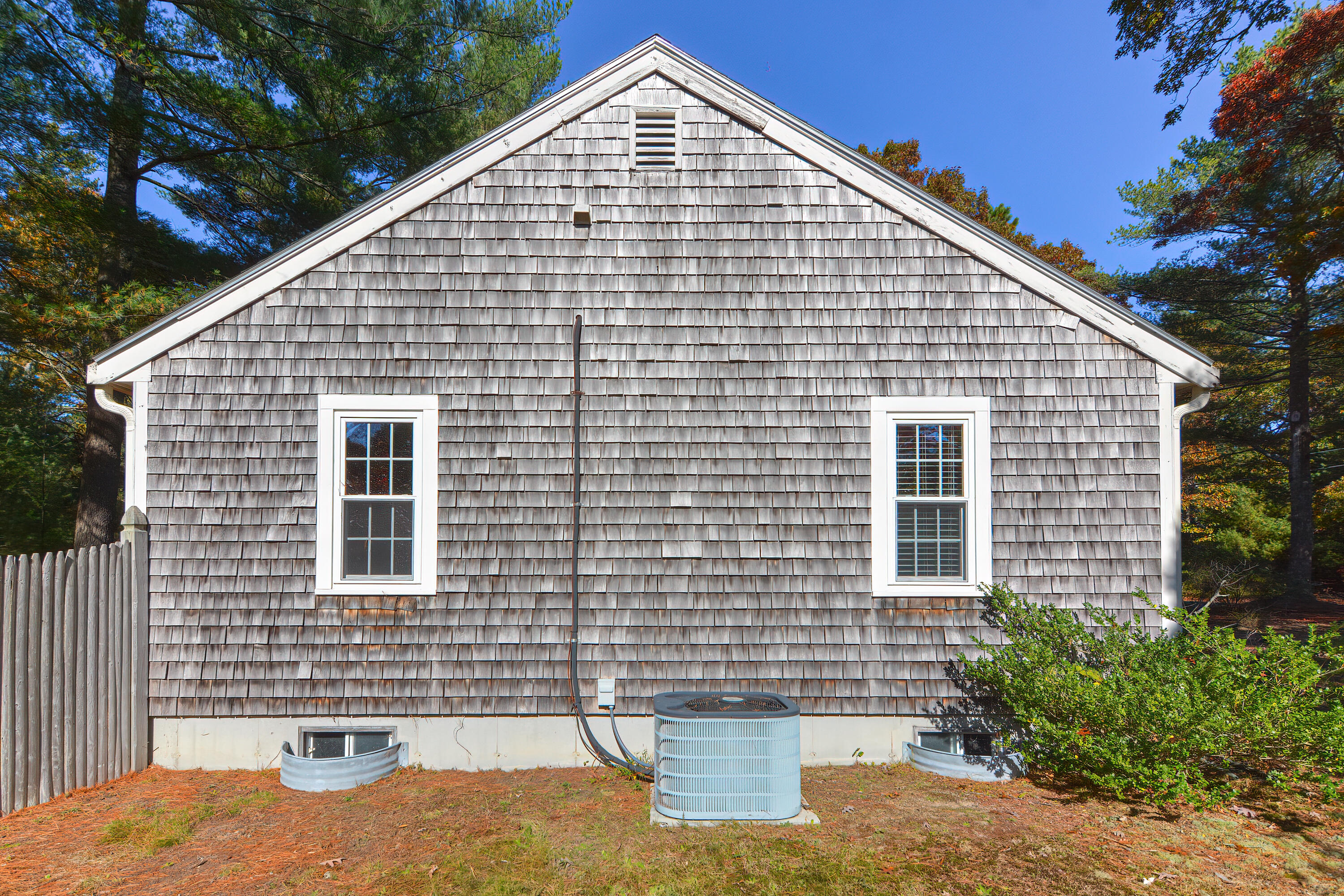 235 Simon Narrows Road Mashpee, MA 02649 - Photo 29 of 30 a view of a house with a yard