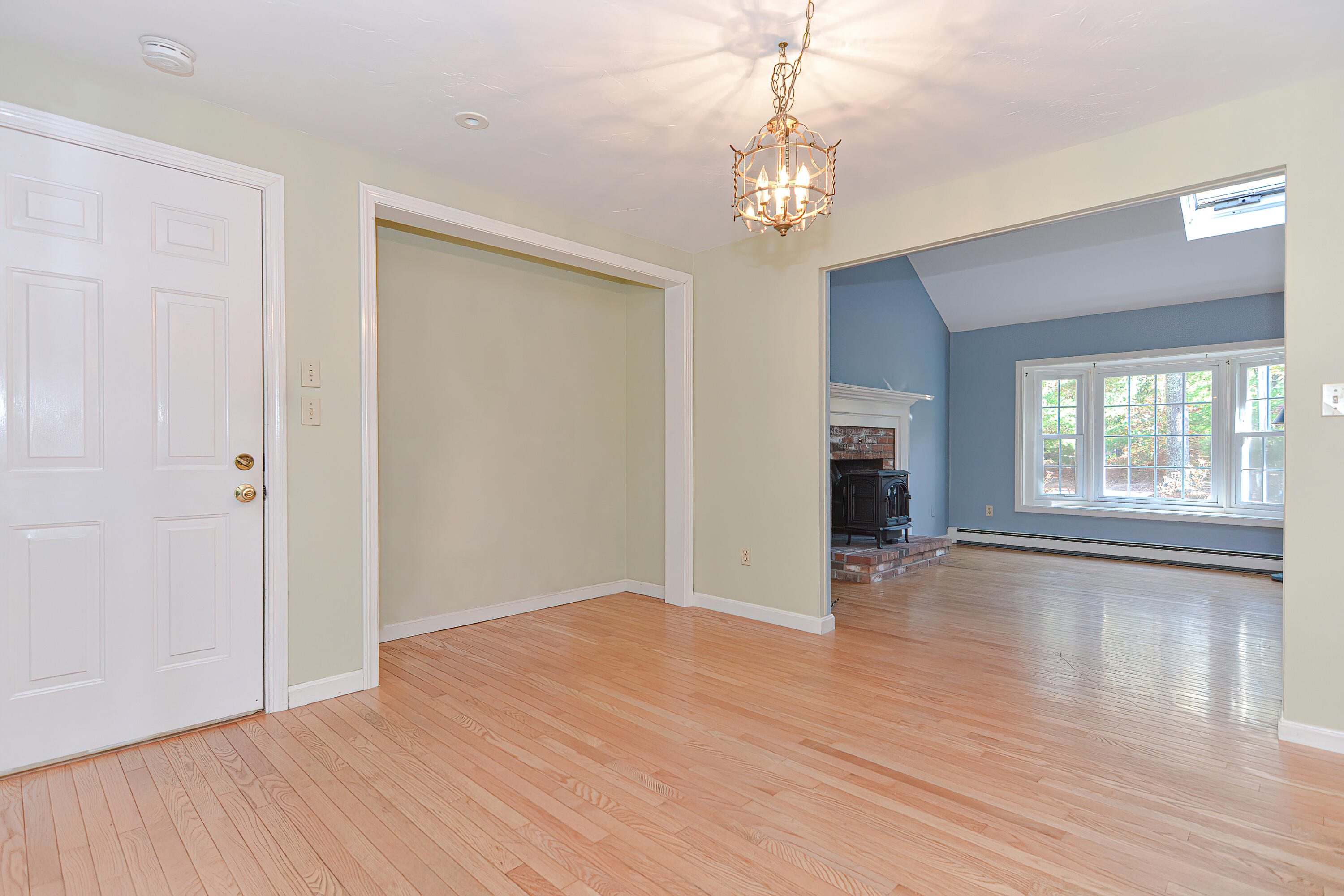 235 Simon Narrows Road Mashpee, MA 02649 - Photo 6 of 30 wooden floor in an empty room with a window