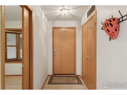 a view of a livingroom with wooden floor