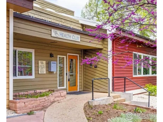 a room with lots of potted plants