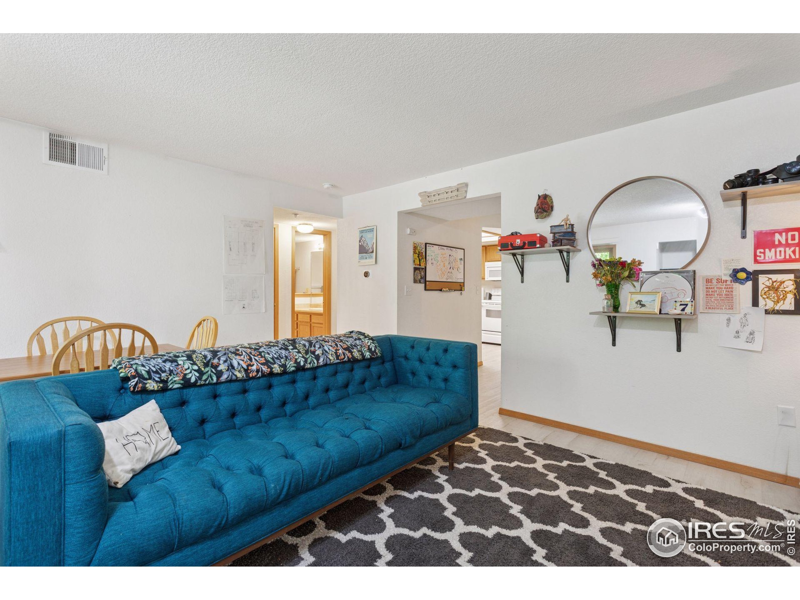 2802 Sundown Lane, Unit 102 Boulder, CO 80303 - Photo 5 of 41 a living room with furniture