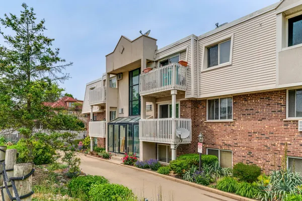 a front view of a multi story residential apartment building