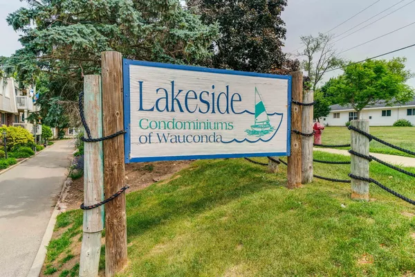 a sign on the side of the road