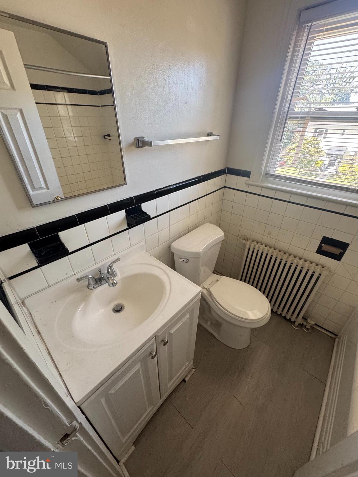 2801 Q Street Southeast Washington, DC 20020 - Photo 6 of 6 a bathroom with a sink and a mirror