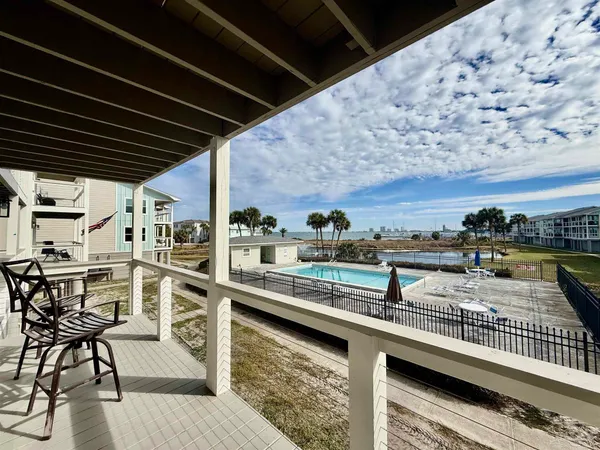 a view of balcony with seating space