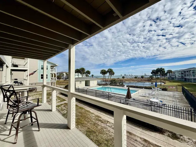 a view of balcony with seating space