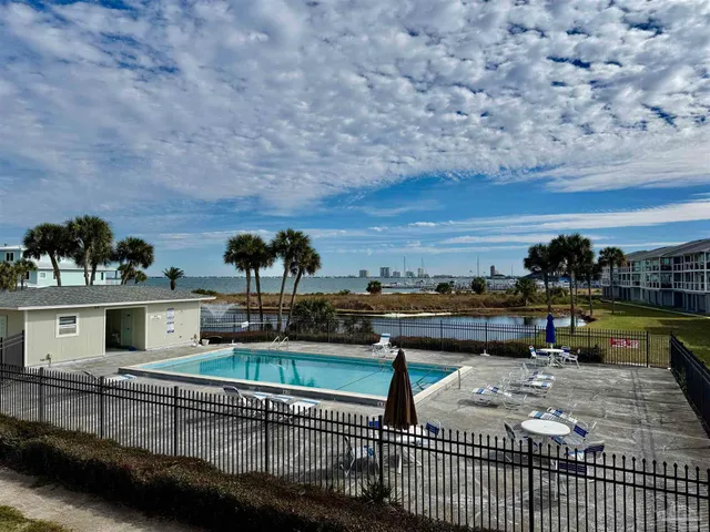 a view of a terrace with chairs