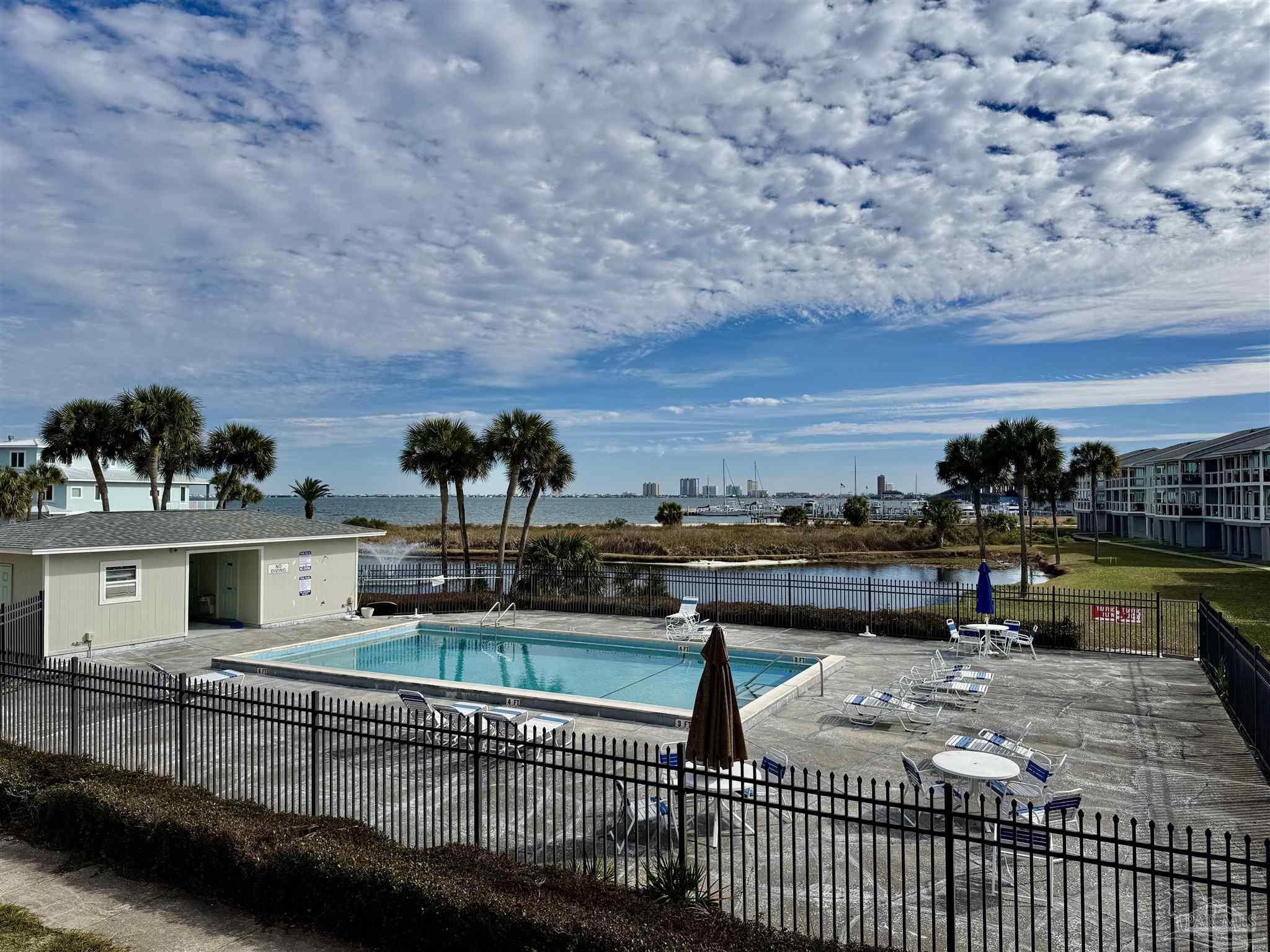 200 Pensacola Beach Road, Unit F3 Gulf Breeze, FL 32561 - Photo 26 of 27 a view of a terrace with chairs