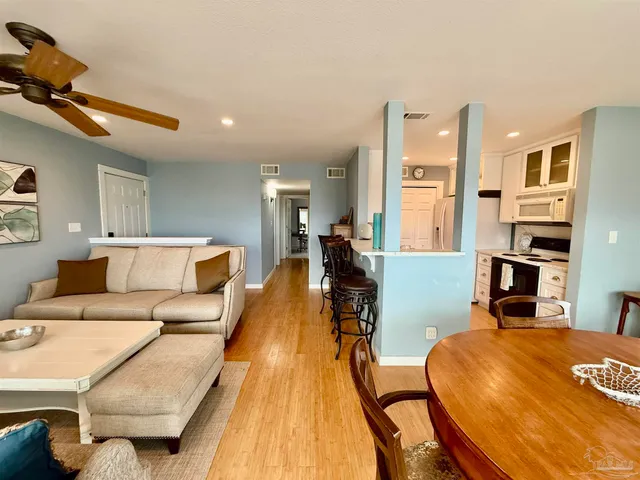 a living room with furniture and a table