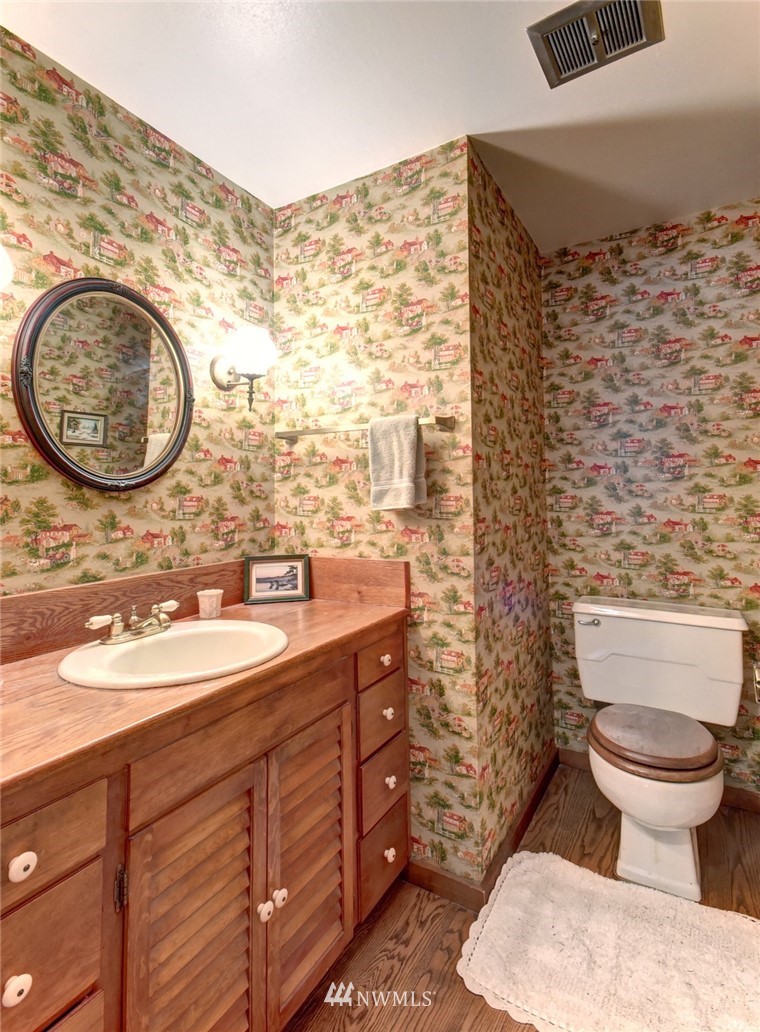 36210 Mann Road Sultan, WA 98294 - Photo 14 of 30 a bathroom with a toilet sink and mirror