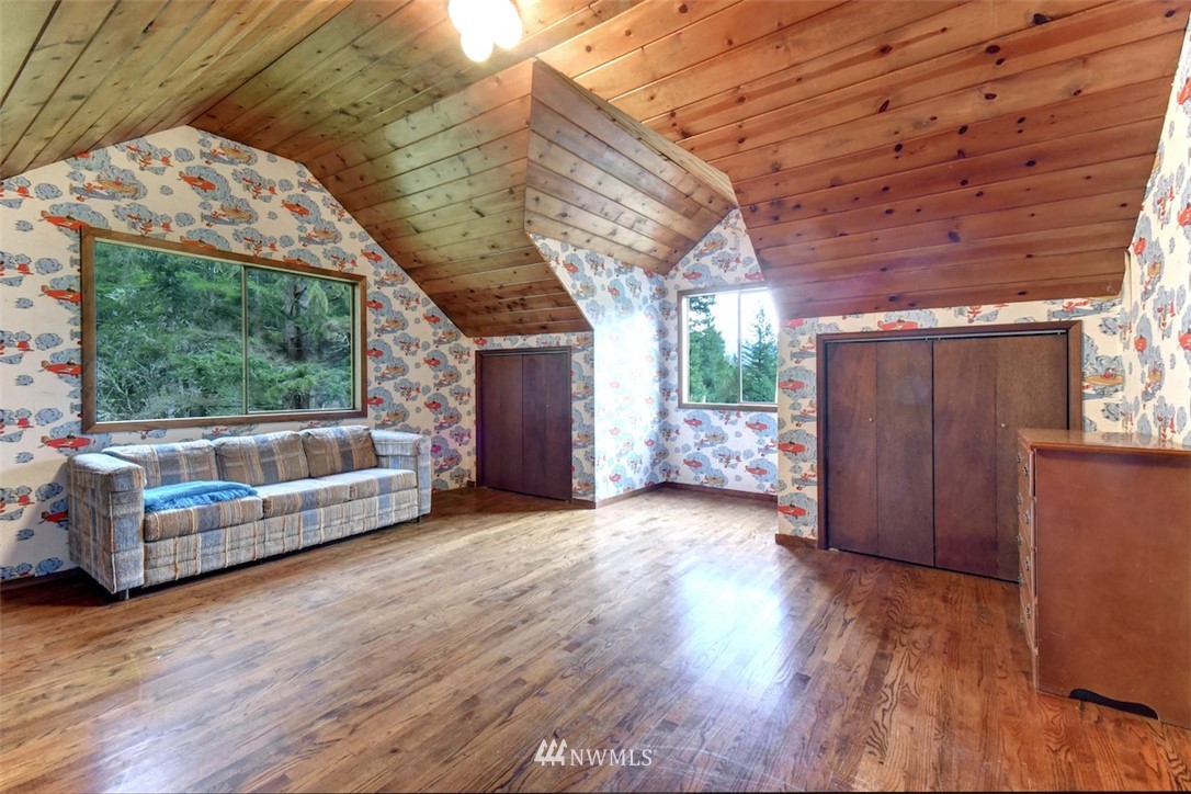 36210 Mann Road Sultan, WA 98294 - Photo 22 of 30 a view of a porch with wooden floor and roof