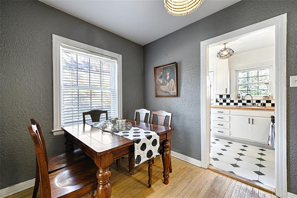 1707 Homewood Place Dallas, TX 75224 - Photo 6 of 21 a view of a dining room with furniture and window
