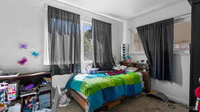 a room with toys and a wooden floor