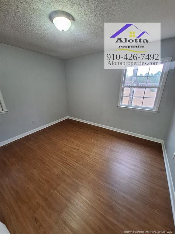 819 Ridge Road, Unit B Fayetteville, NC 28311 - Photo 2 of 7 an empty room with a window