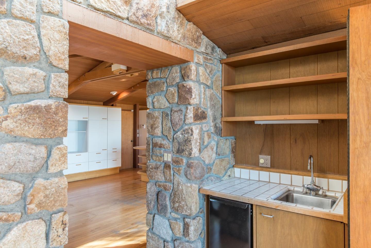 3044 Cormorant Road Pebble Beach, CA 93953 - Photo 23 of 49 a bathroom with a sink and a mirror