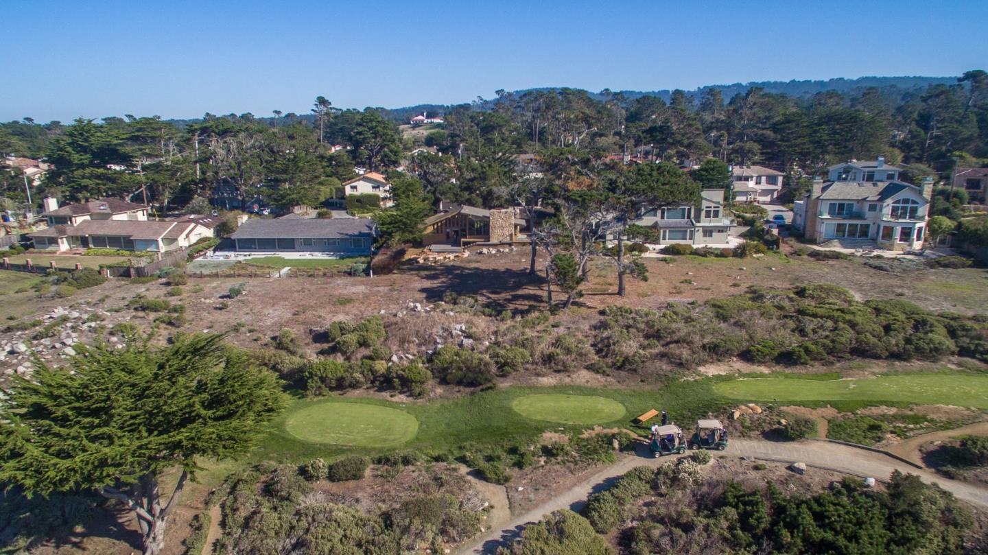 3044 Cormorant Road Pebble Beach, CA 93953 - Photo 46 of 49 a view of a garden with a building in the background