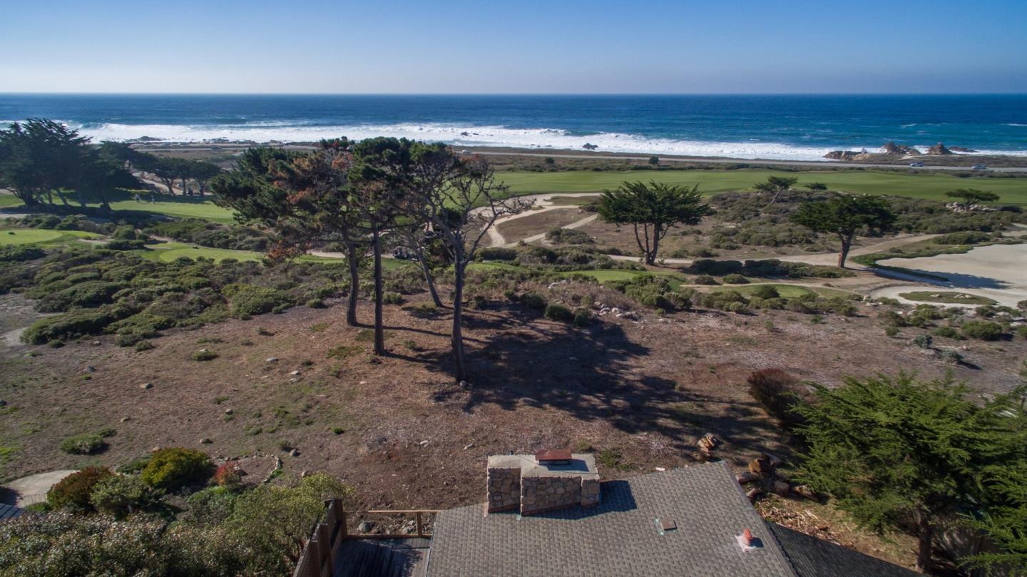 3044 Cormorant Road Pebble Beach, CA 93953 - Photo 48 of 49 a view of a lake with a mountain