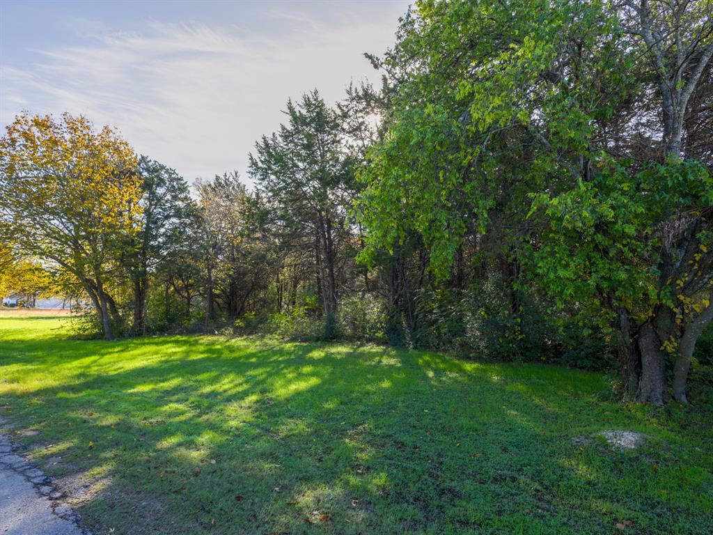 618 Cavan Road Duncanville, TX 75116 - Photo 1 of 1 a backyard of a house with lots of green space