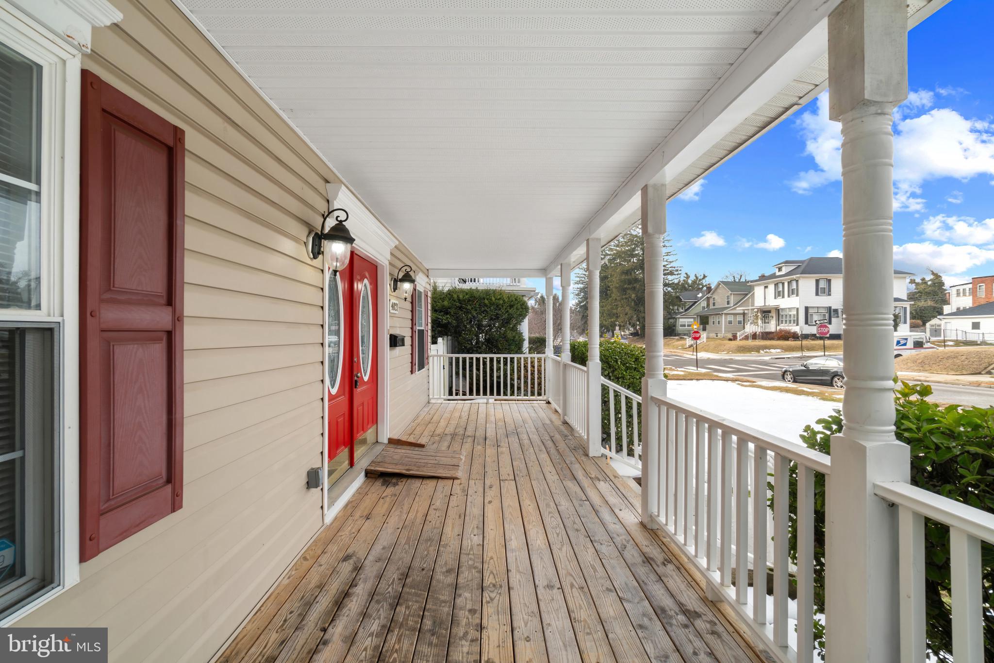4021 Barrington Road Baltimore, MD 21207 - Photo 41 of 50 a view of balcony with wooden floor