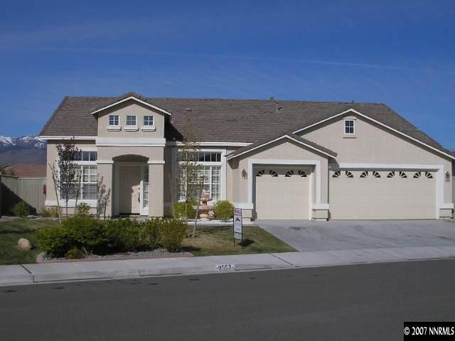 9553 Steep Climb Court Reno, NV 89521 - Photo 1 of 9 a view of a house with a street