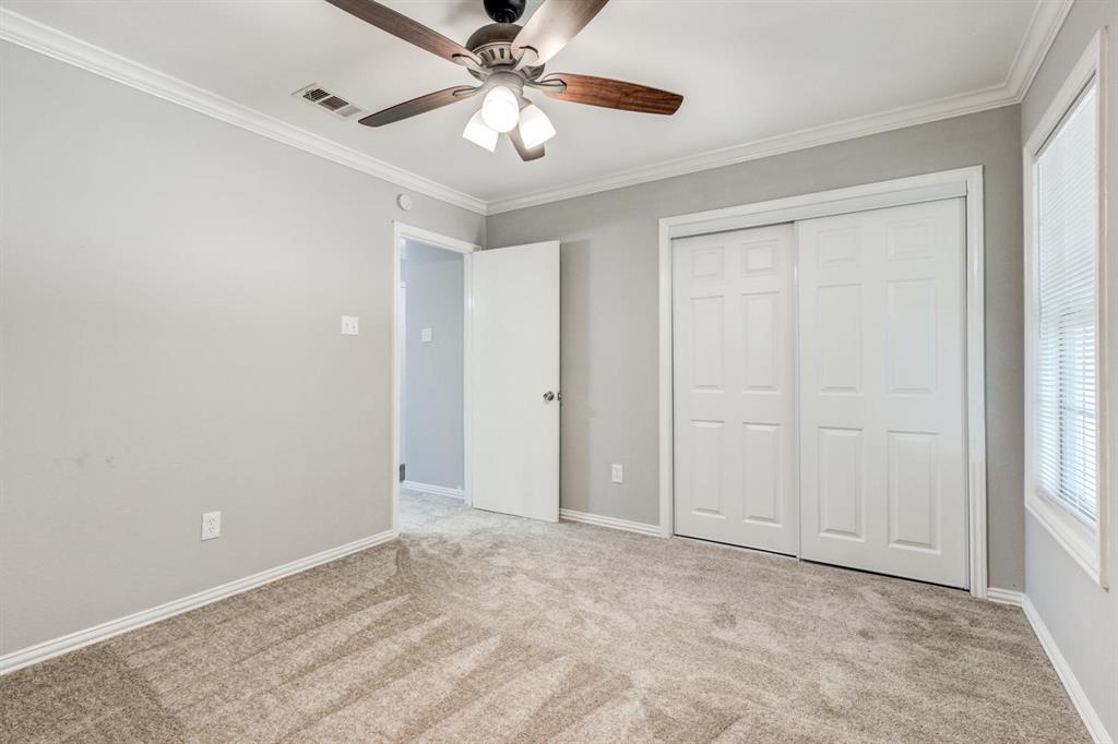 210 Rolston Road, Unit 8 Irving, TX 75060 - Photo 22 of 24 a view of an empty room