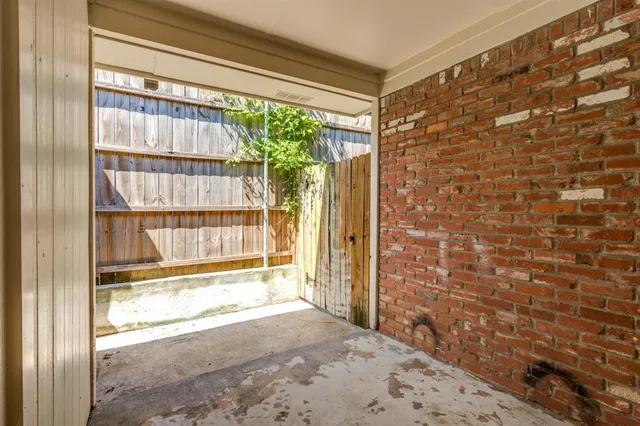 a view of a room with a large window