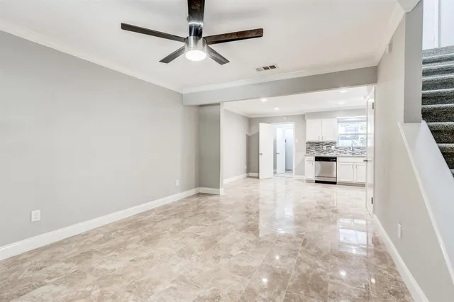 a view of a kitchen with a sink and cabinets