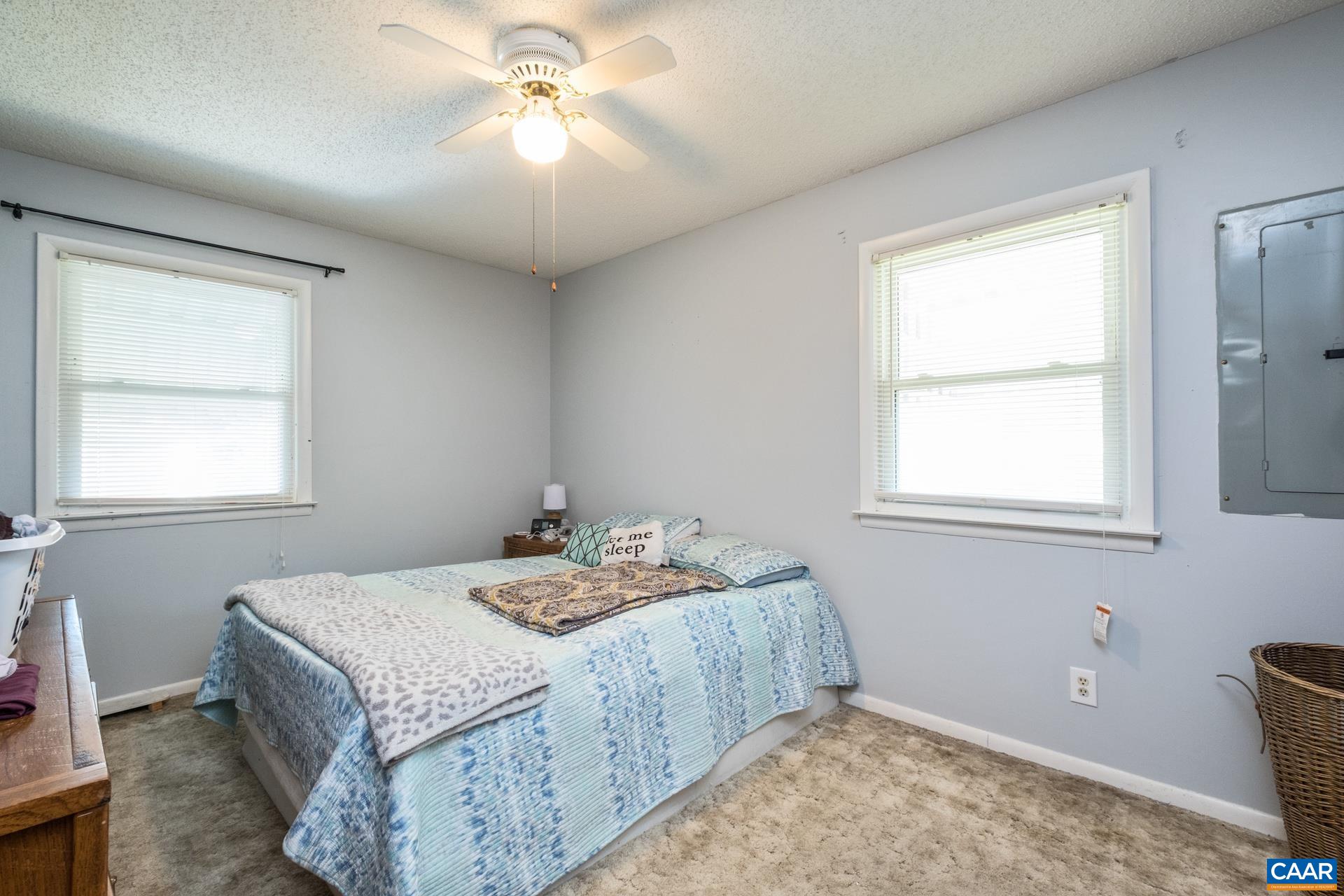 182 Clinton Street Harrisonburg, VA 22802 - Photo 12 of 21 a bedroom with a bed and a window