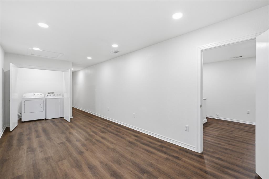 3227 Proctor Avenue Waco, TX 76708 - Photo 12 of 23 a view of a room with wooden floor and white walls