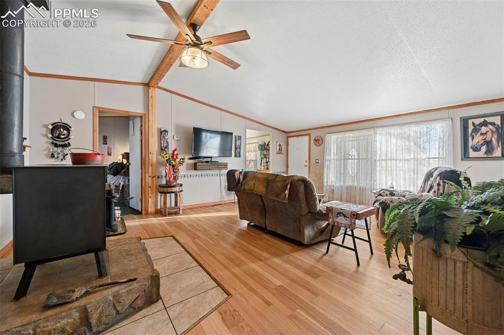 35875 Shear Road Yoder, CO 80864 - Photo 16 of 45 a living room with furniture and a window