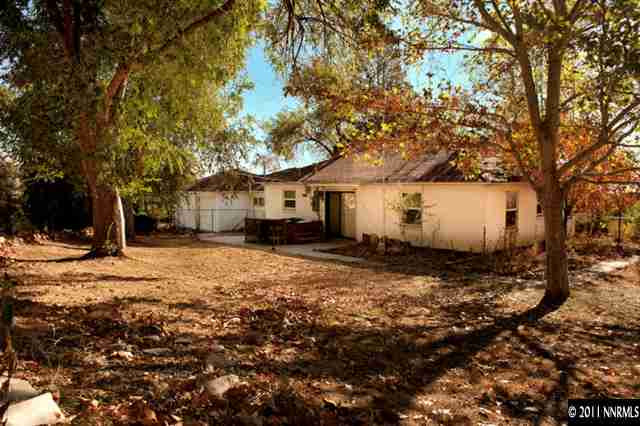 600 Hoge Road Reno, NV 89506 - Photo 13 of 13 a view of a white house that has a tree in it