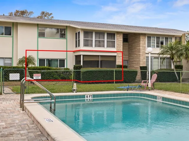 a view of house with a yard from a house