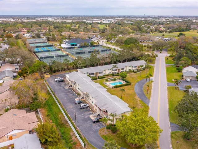 front view of a house with a garden
