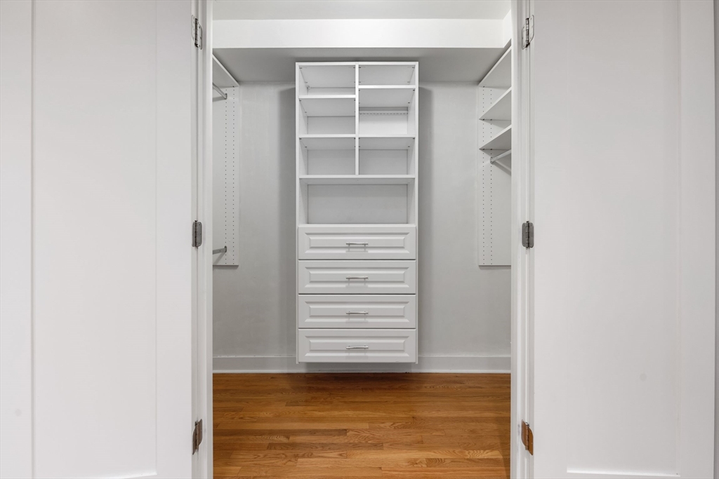 242 Shawmut Avenue, Unit 1B Boston, MA 02118 - Photo 10 of 16 a view of walk in closet with empty racks
