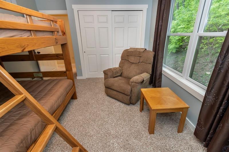 2226 County Line Road Champion, PA 15622 - Photo 27 of 33 a living room with furniture and a window