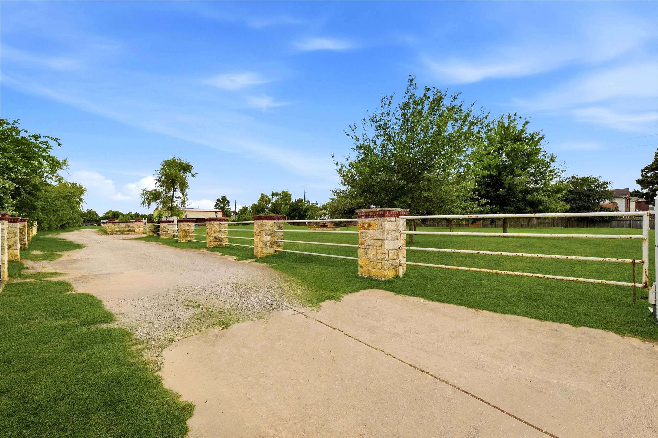 11741 Ezekiel Road Tomball, TX 77375 - Photo 4 of 30 a view of a golf course with a lake