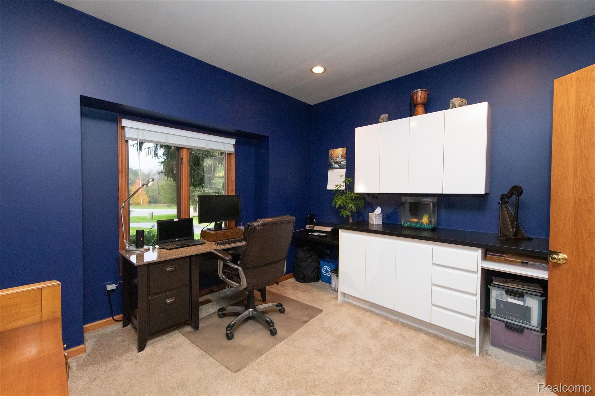 8652 Miller Road Clarkston, MI 48348 - Photo 18 of 47 Built-in desk, cabinetry & shelves