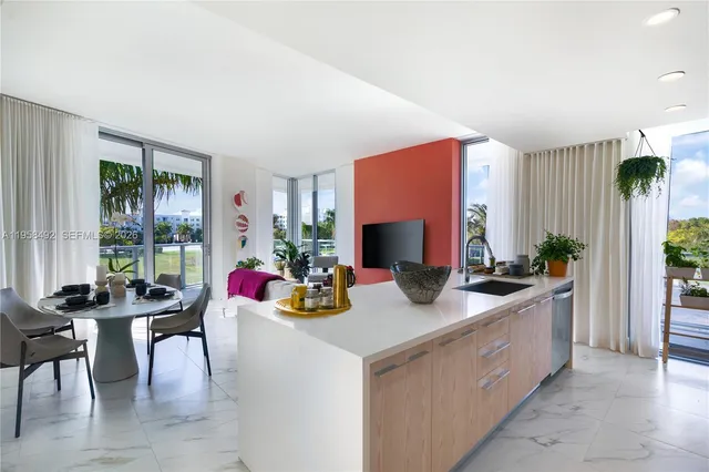 a view of living room kitchen and microwave