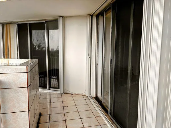 $255,000 | 1300 Northeast Miami Gardens Drive, Unit 1001E, Miami, FL 33179