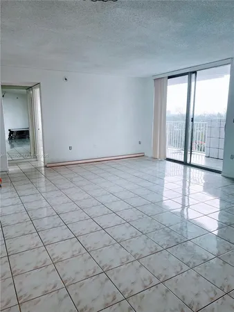 $255,000 | 1300 Northeast Miami Gardens Drive, Unit 1001E, Miami, FL 33179