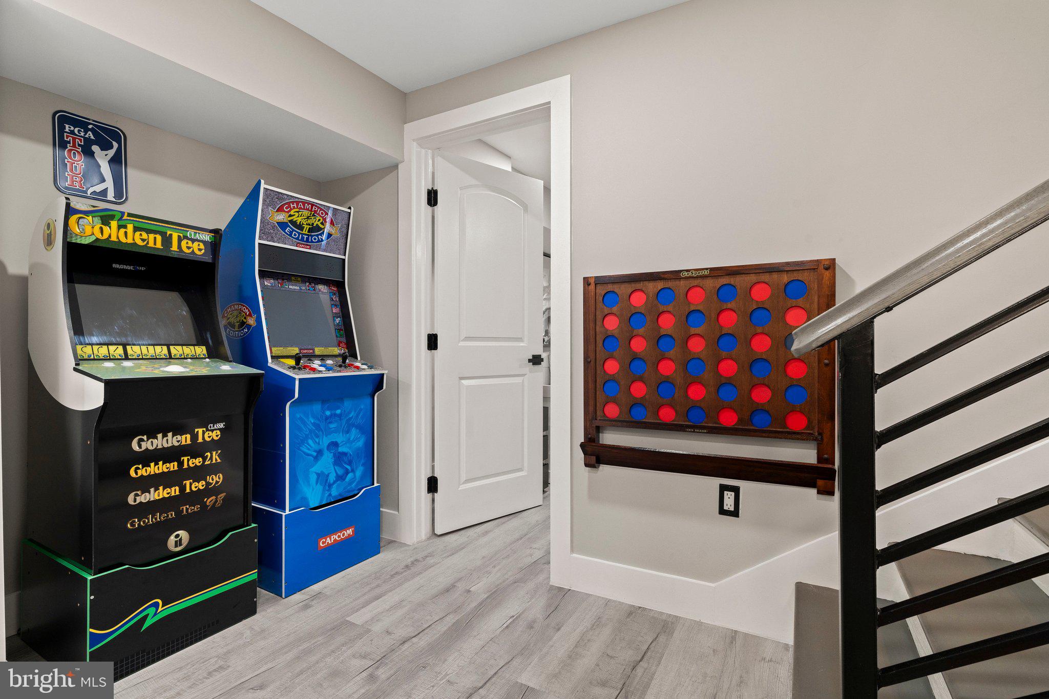 124 Master Street Philadelphia, PA 19122 - Photo 20 of 39 a living room with furniture a flat screen tv and a walk in closet