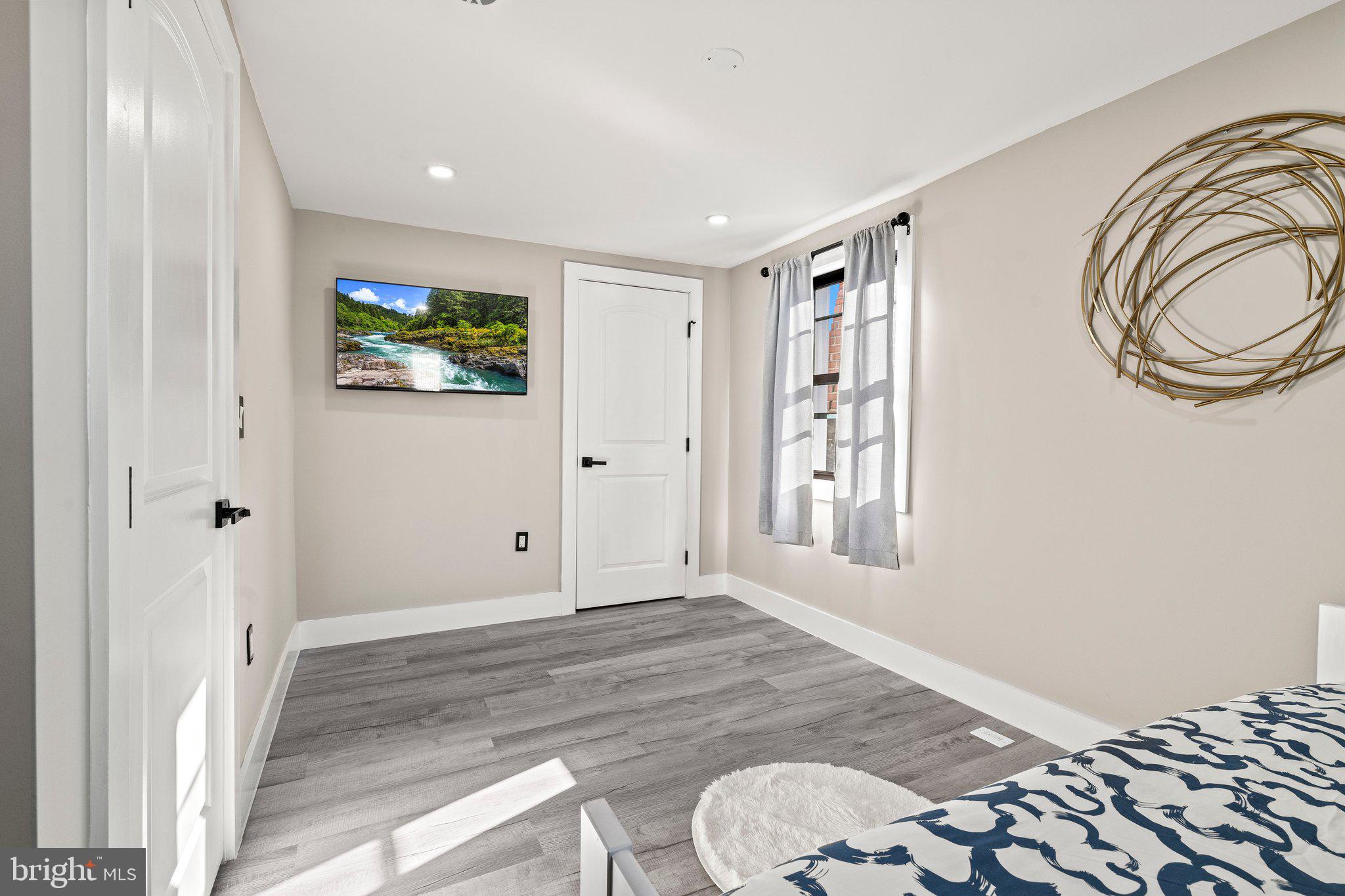 124 Master Street Philadelphia, PA 19122 - Photo 29 of 39 a view of a livingroom with wooden floor