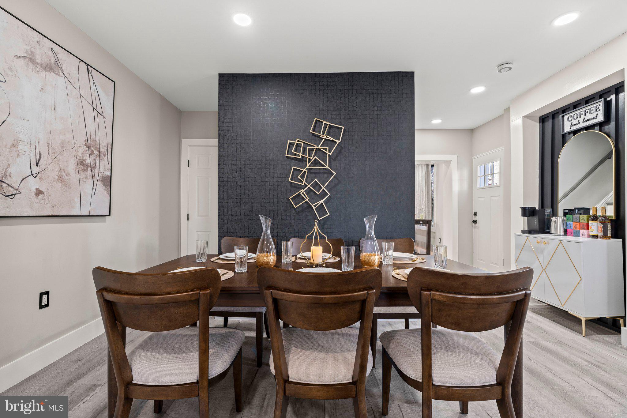 124 Master Street Philadelphia, PA 19122 - Photo 5 of 39 a dining room with furniture and window