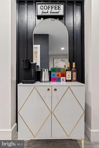 a view of hall way with furniture