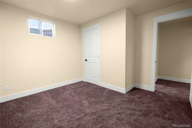 an empty room with closet